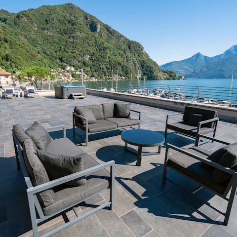 Settle down on the terrace with your holiday read and lake views