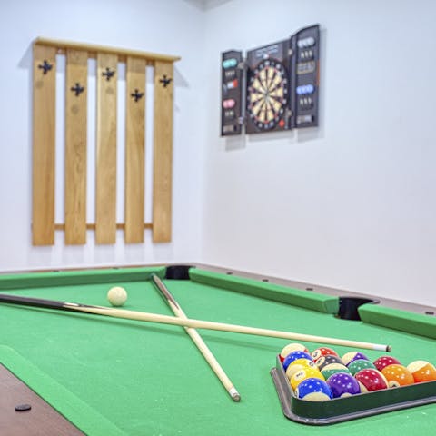 Challenge your group to a friendly game of pool or darts