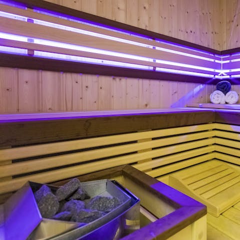 Take a moment to unwind in style in the Finnish sauna