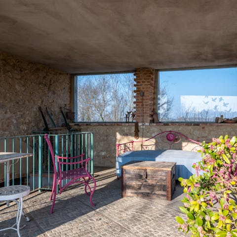 Enjoy an ice cold drink in the shade of the covered terrace