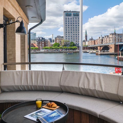 Tuck into a balcony breakfast overlooking the water