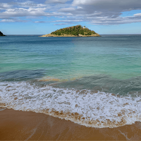 Stroll down to Ondarreta Beach and paddle about in La Concha Bay