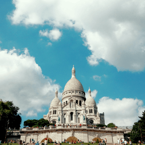 Visit the iconic Basilica of Sacré-Cœur, a short metro ride away