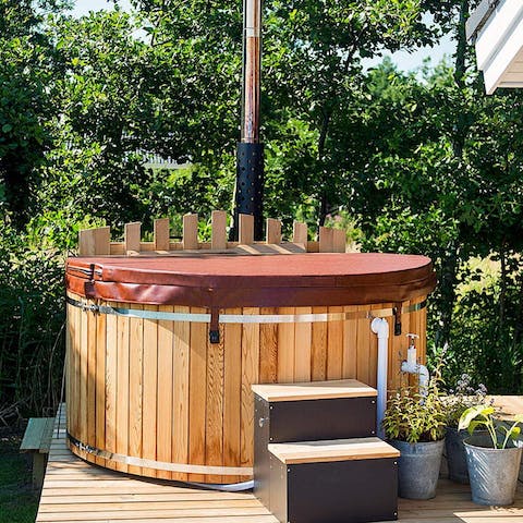 Sink into the hot tub for a long soak under the stars