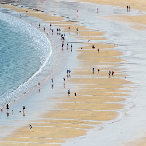 Spend a day on the sands of La Concha, a good twenty-minute walk away