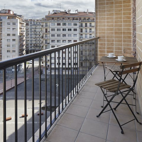 Sip a chilled glass of Spanish Amaro on your balcony