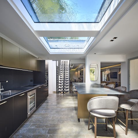 Get a unique view of the pool  from the kitchen