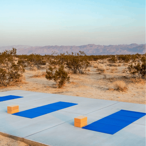 Unwind with an alfresco yoga class in the middle of the desert
