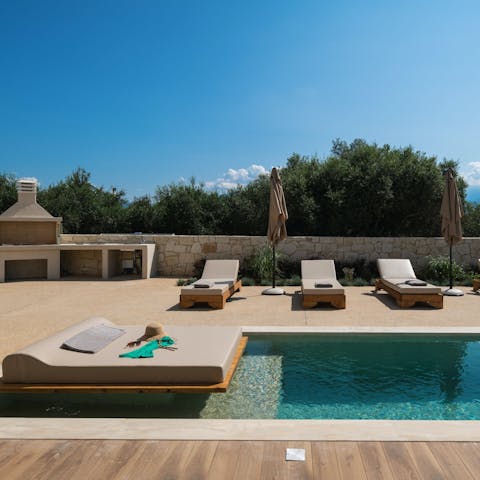 Soak up the Cretan sun on the daybed