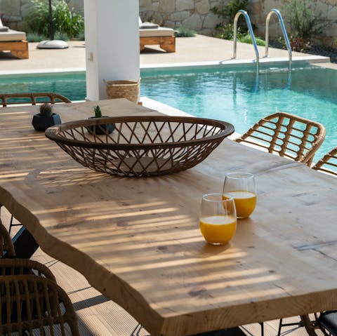 Enjoy a Greek salad by the pool