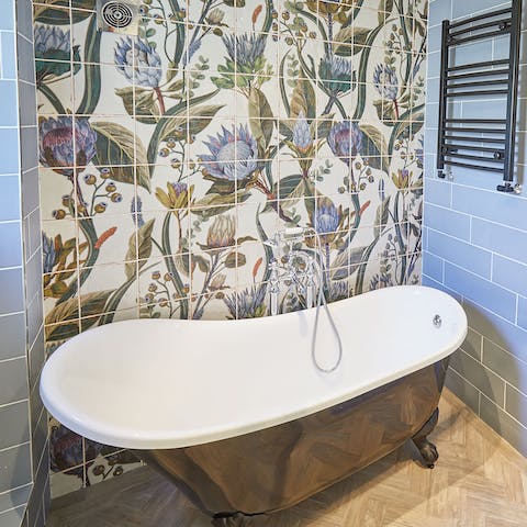 Take a self-care moment as you luxuriate in the clawfoot tub