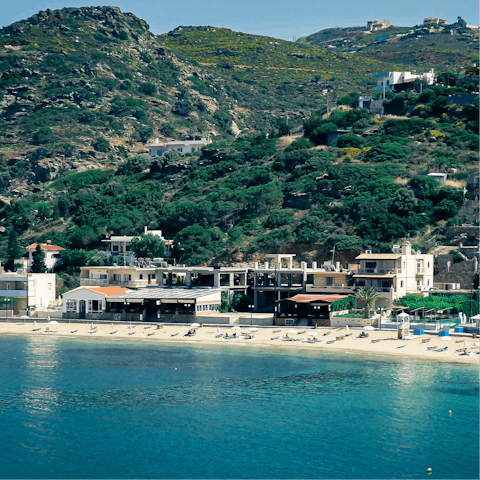 Drive down to Malia's gorgeous golden coastline
