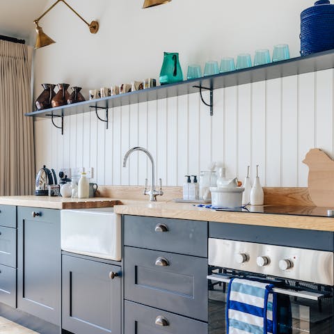 Rustle up something tasty in the blue farmhouse-style kitchen