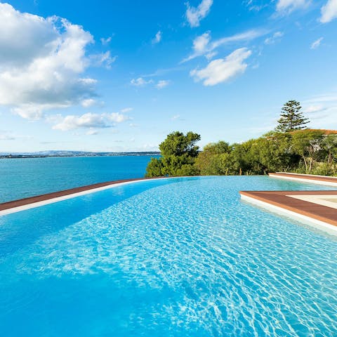 Swim in the private pool as you drink in the sea views