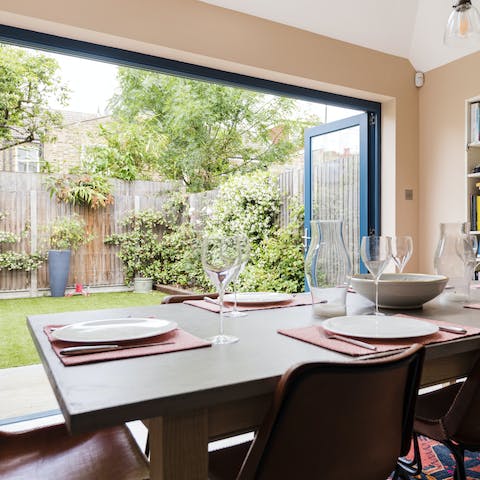 Take in views of the garden while enjoying a home-cooked dinner from the large dining table 