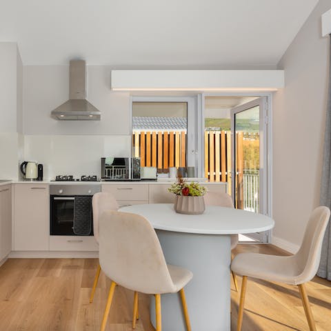 Share memorable meals together around the sleek dining table