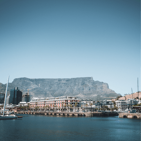 Spend the day shopping and dining along the V&A Waterfront, a short drive away