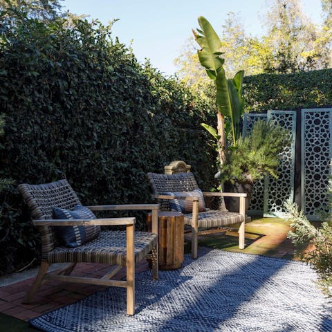 Savour moments of calm while relaxing on the private patio