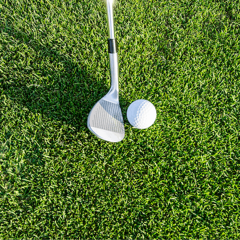 Practice your swing at the local golf course, you're within walking distance