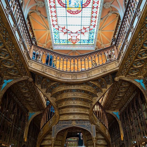 Admire the beautiful Livraria Lello bookshop, a twenty-two-minute walk away