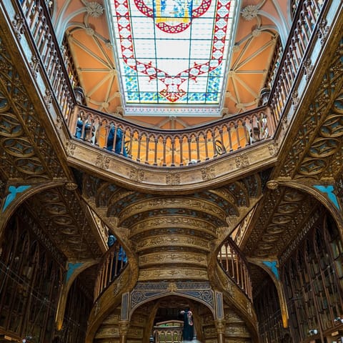 Admire the beautiful Livraria Lello bookshop, a twenty-two-minute walk away
