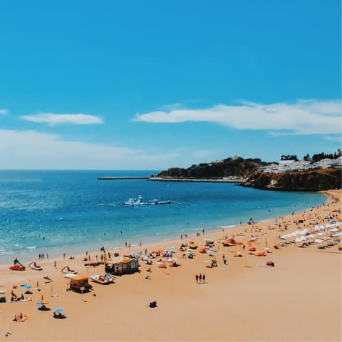 Find the crystal clear waters of Praia do Túnel only minutes away