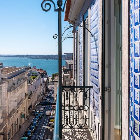 Admire the fabulous views over the River Tagus from your balcony