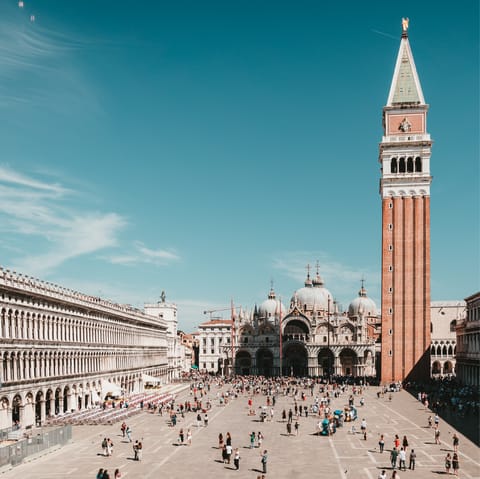 Visit bustling St. Mark's Square, a one-minute walk away