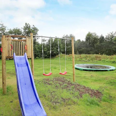 Keep little ones entertained on the play equipment and trampoline