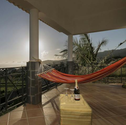 Recline in the hammock with a good book and a glass of wine as you enjoy the views