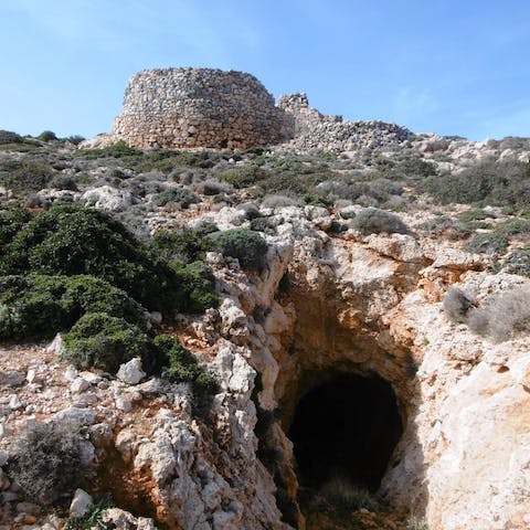 Visit the Chainospilios Caves, a short drive away