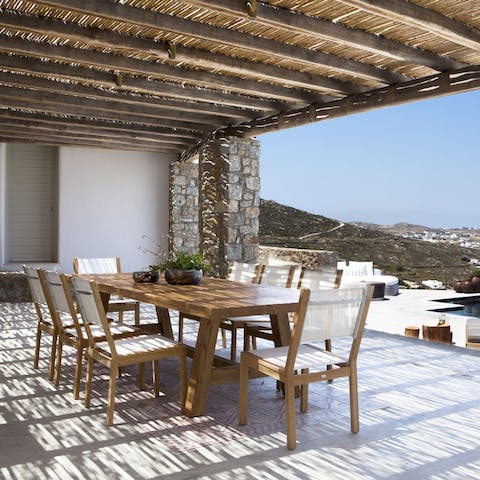 Dine on sumptuous alfresco feast looking out over lush vistas