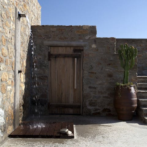 Refresh yourself at the outdoor shower after a hot day