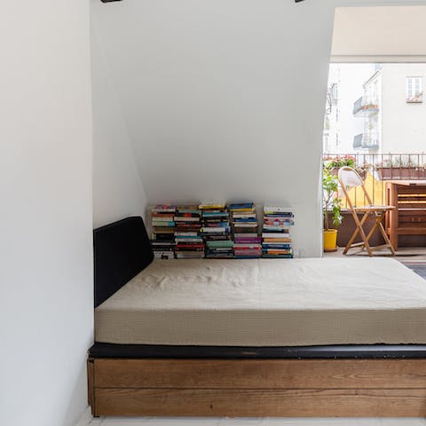 Get cosy with a book in the snug reading corner 