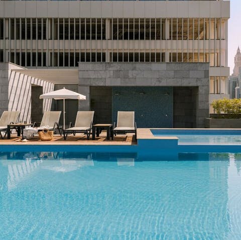 Head to the building's communal pool for a refreshing dip