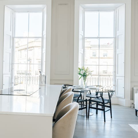 Dine in the light-filled open-plan kitchen and dining room – it feels oh so elegant