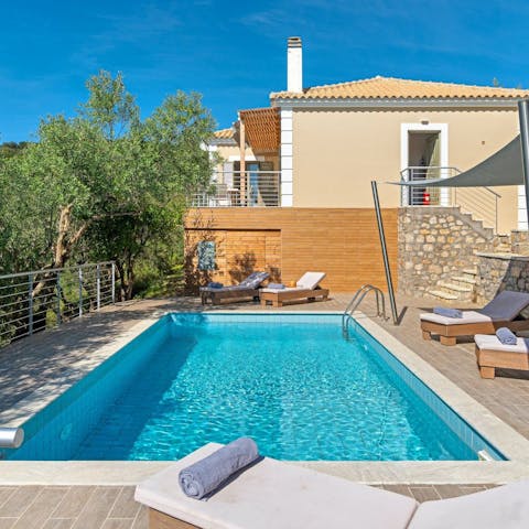 Laze around the private swimming pool at every opportunity