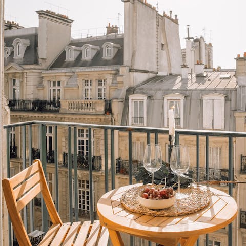 Sip wine on the balcony before dining in a local bistro