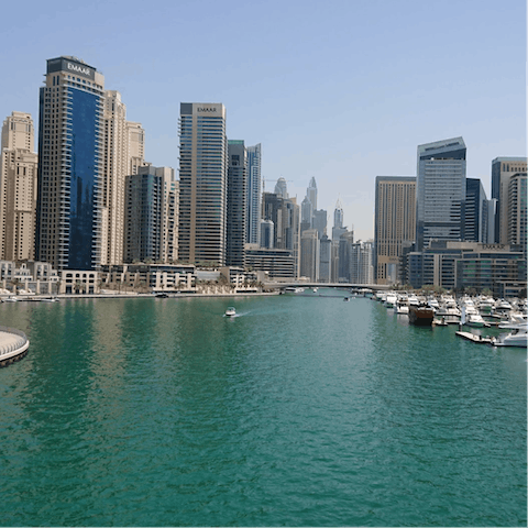 Explore the stunning Dubai Marina, reachable by car