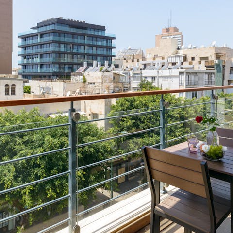 Start your day with a cup of coffee out on the balcony, with the sea glistening in the distance 