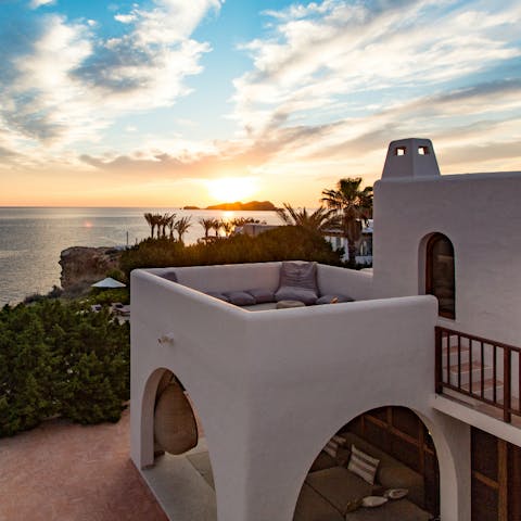 Watch the sunset from the snug roof terrace