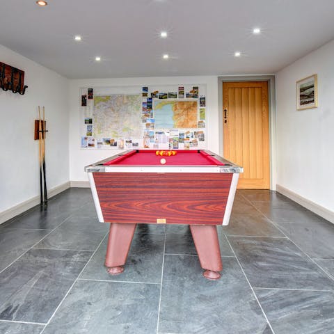 Play a game of pool in the games room