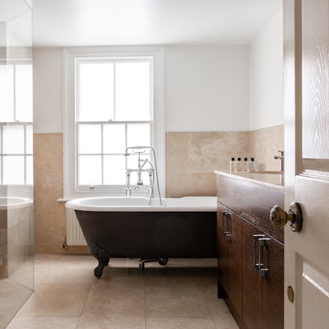 Soak travel-weary legs in the roll top bath