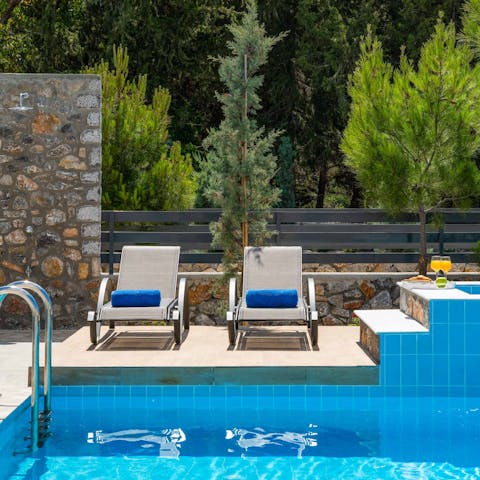 Spend relaxing days by the pool or walk to Lardos beach