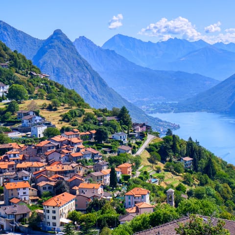 Stay in the picturesque town of Lugano, surrounded by mountains and a twenty-minute walk away from the stunning lake 