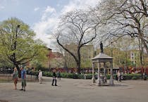 People watch in the always vibrant Tompkin's Square Park