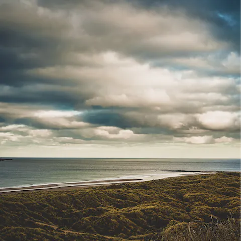 Take the the twenty-minute mosey to Beadnell Bay Beach