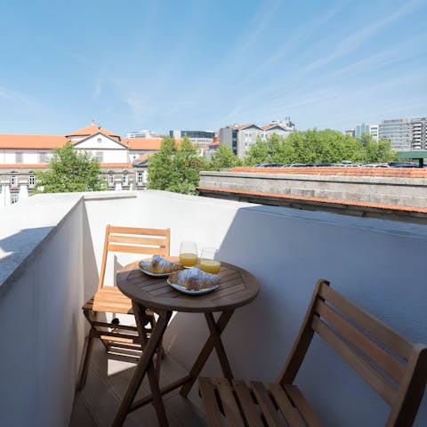Enjoy an alfresco breakfast on the sunny balcony