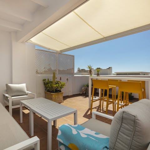 Lose yourself in the pages of a good book and relax on the private rooftop terrace