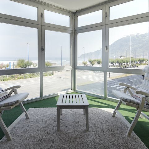 Sit back with a drink in the corner conservatory and enjoy the sea views